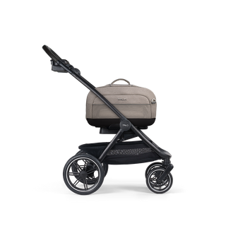 A Dupree I Pet Car Seat, in merle, and attached to the Roscoe Trek 2.0 Pet Stroller Frame from a side profile
