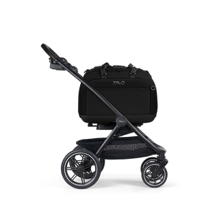 A Hendrickx Pet Car Seat, in onyx, and attached to the Roscoe Trek 2.0 Pet Stroller Frame from a side profile
