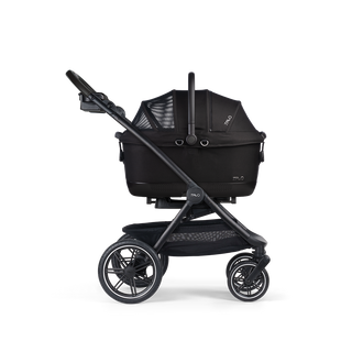 A Maeve iso 6x Pet Car Seat closed, in onyx, and attached to the Roscoe Trek 2.0 Pet Stroller Frame from a side profile