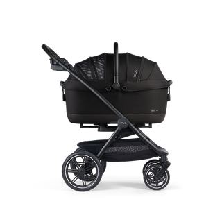 A Maeve iso 7x-R Pet Car Seat closed, in onyx, and attached to the Roscoe Trek 2.0 Pet Stroller Frame from a side profile