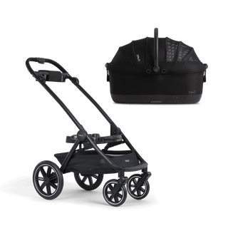 A Maeve iso Wind 7x-R Pet Car Seat closed, in onyx, sitting next to the Roscoe Trek 2.0 Pet Stroller Frame