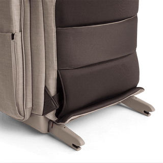 A Kamella Pet Backpack and Car Seat, in fawn, zoomed in on the isofix latches