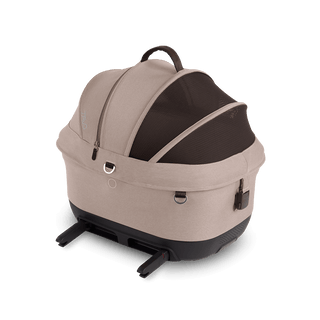 Maeve iso5x pet car seat in the fawn fashion shown from the side with its integrated ISOFIX latches out