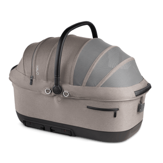 A Maeve iso 7x-L Pet Car Seat in the fashion merle on an angle with the ISOFIX latches out