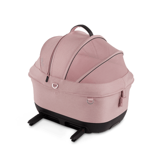 Maeve iso5x Wind pet car seat in the sakura fashion shown from the side with its integrated ISOFIX latches out