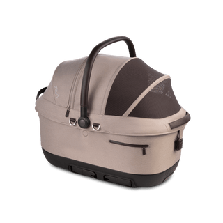 A Maeve iso 6x Wind Pet Car Seat in the fashion fawn on an angle with the ISOFIX latches tucked away