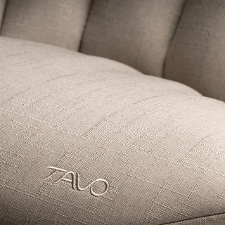 A close-up view of the shell seat pad in fawn showing fabric material