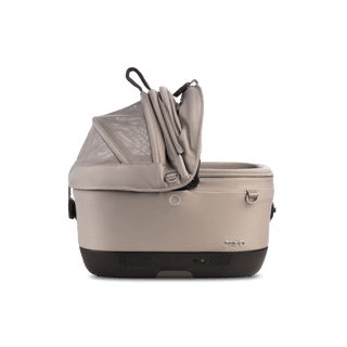 A Maeve iso 5x Wind Pet Car Seat in the fashion tawny from the side with the right side of the canopy open