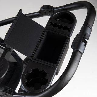 open compartment and cup holder on stroller frame