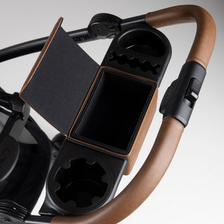 open compartment and cup holder on stroller frame