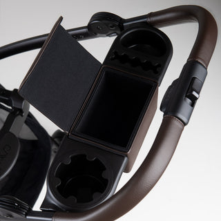 open compartment and cup holder on stroller frame