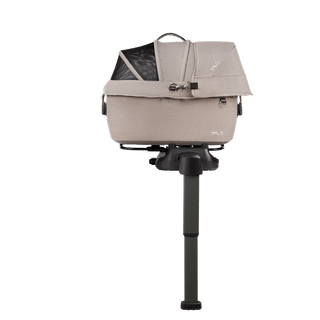 side view of beige small pet car seat on base with extended load leg and side impact protection