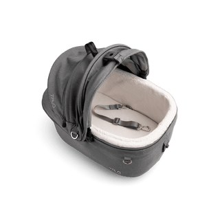 top view of gray small pet car seat with canopy open and leash with white comfort liner