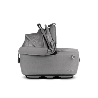 side view of gray small pet car seat with right side of canopy open