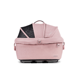 side view of pink small pet car seat with canopy closed