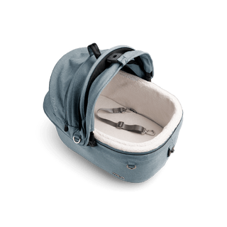 top view of blue small pet car seat with canopy open and leash with white comfort liner