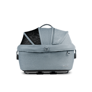 side view of blue small pet car seat with canopy closed