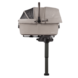 side view of beige medium pet car seat on base with extended load leg and side impact protection