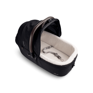 top view of black large pet car seat with canopy open and leash with white comfort liner