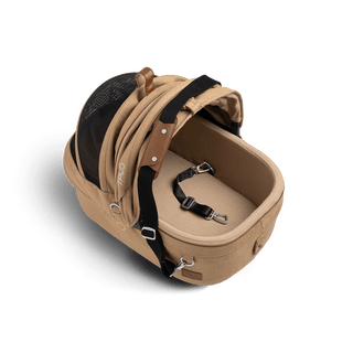 small pet carrier with open canopy and leash